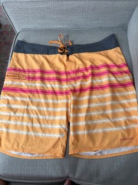 Patagonia orange and Pink Striped Men’s Board Shorts